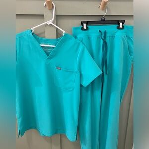 Figs brand new color! Worn a few times and only hung to dry! They are so pretty.